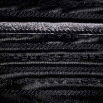 Prada Triangle Zip Backpack Leather