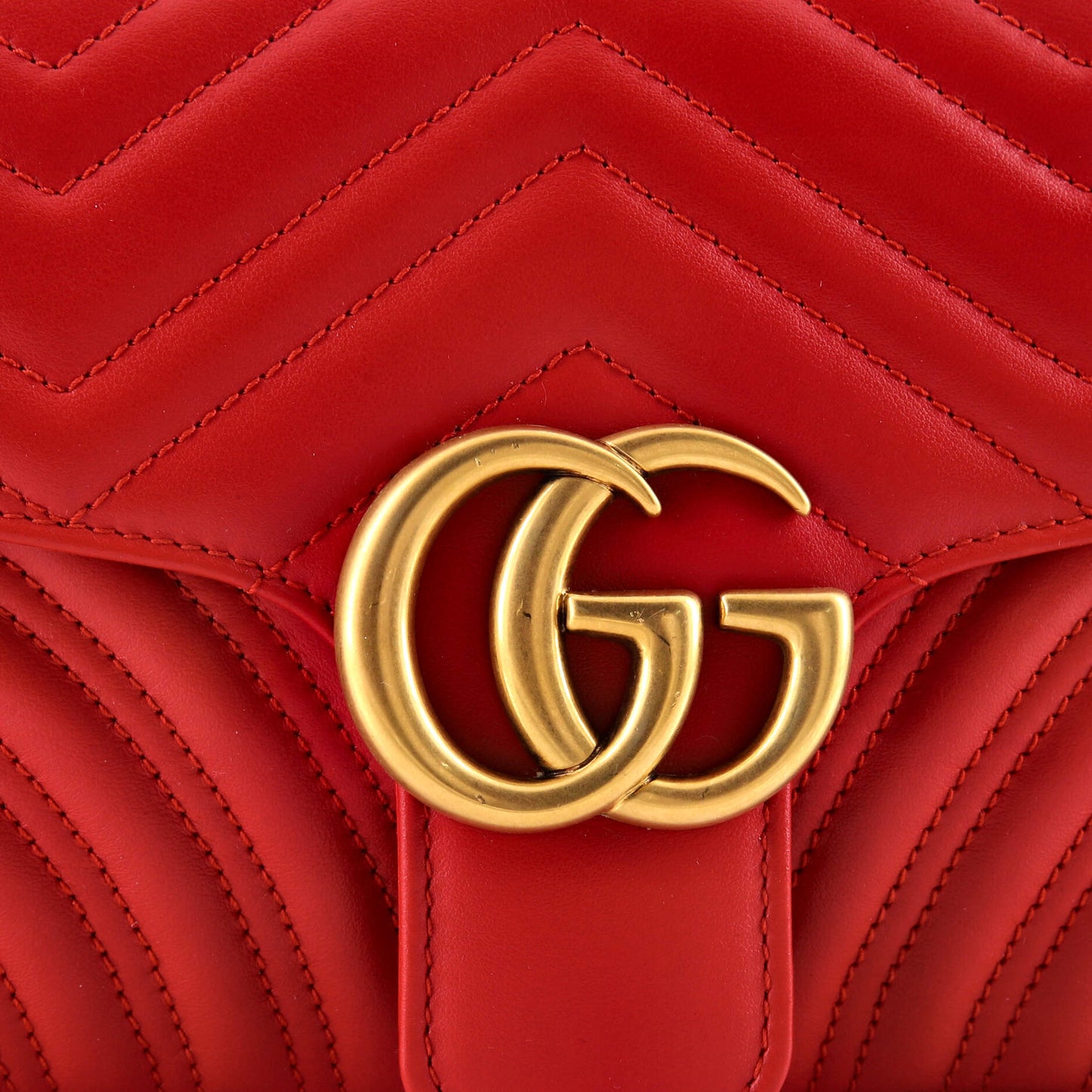 Gucci GG Marmont small flap bag in matelassé leather
