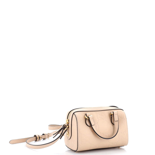 Gucci Jumbo Mini Convertible Top Handle Bag in GG Embossed Leather