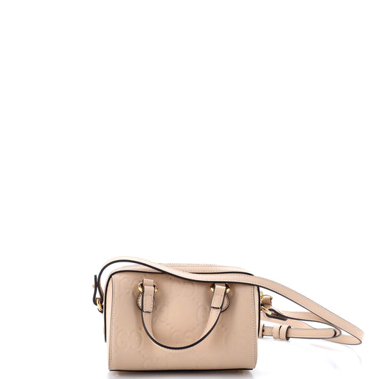 Gucci Jumbo Mini Convertible Top Handle Bag in GG Embossed Leather