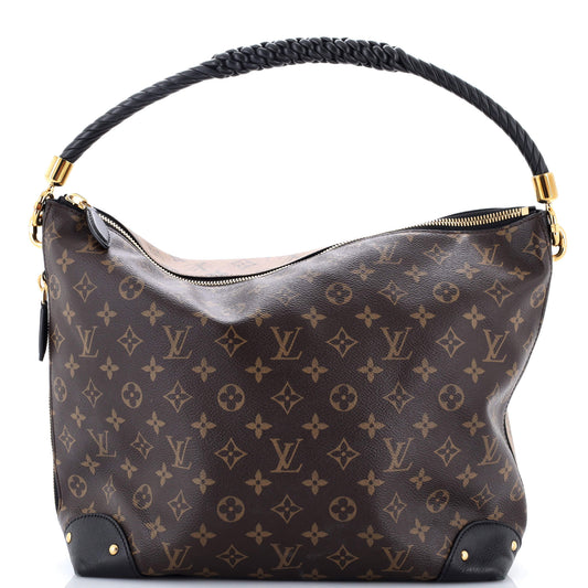 Louis Vuitton Triangle Softy Bag in Reverse Monogram Canvas