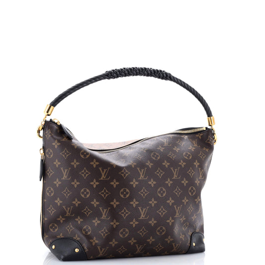 Louis Vuitton Triangle Softy Bag in Reverse Monogram Canvas